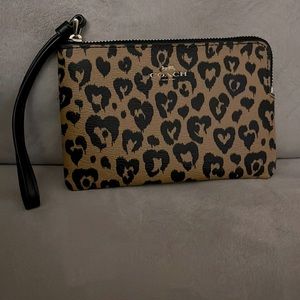 Brand new! Never used, Cheetah coach wristlet!